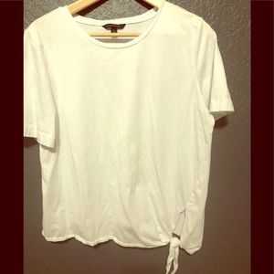 White top with a bottom tie